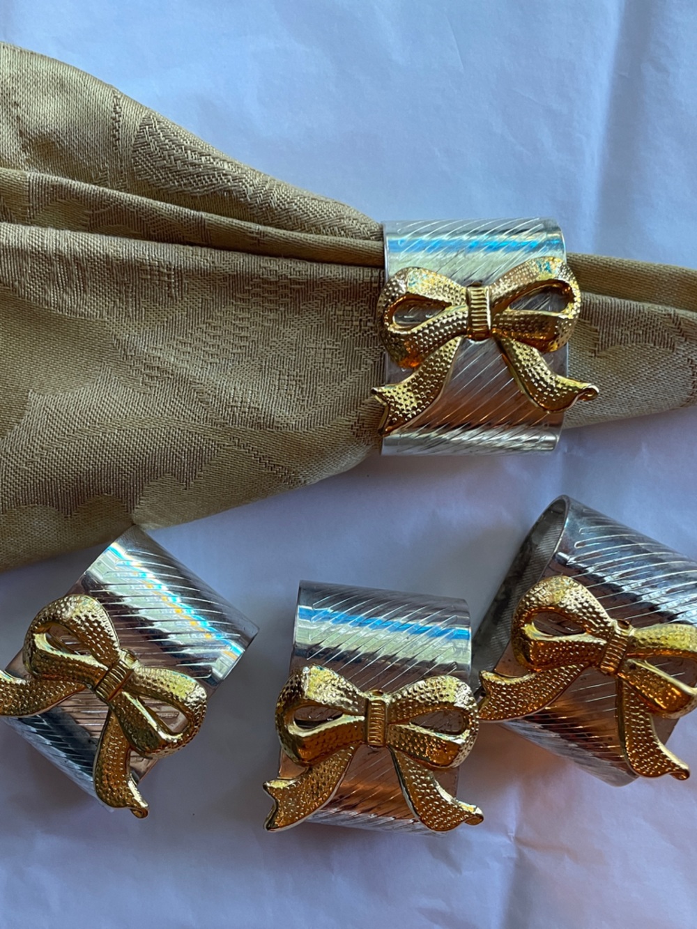 Vintage Silver plated  Napkin Rings - Set of 4 . Golden bow . Original box